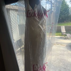 Brand new in bag wedding dress. Not altered and not worn.